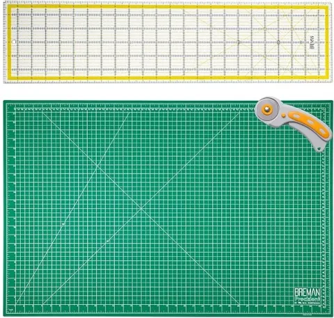 Photo of rotary cutter, mat, and clear ruler. 
