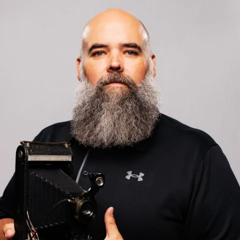 John Zsiray, journalist and Logan Library Board of Directors Chair.